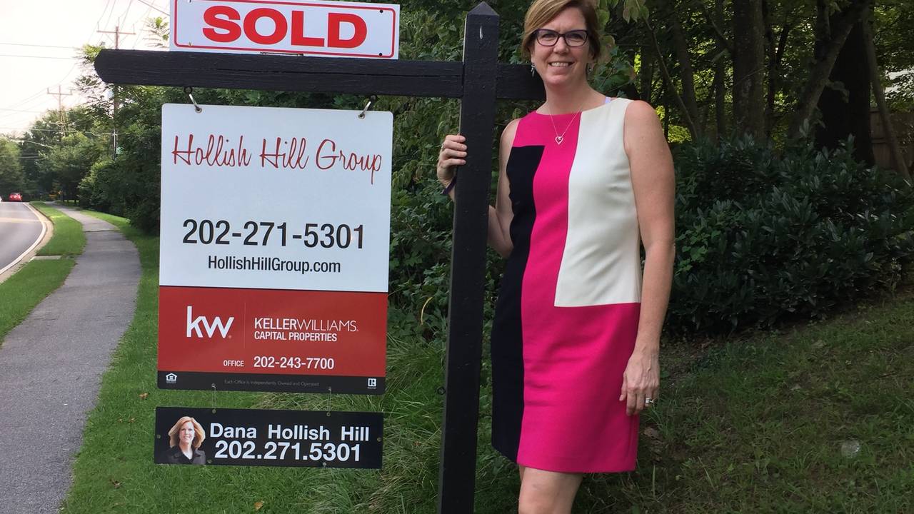 Dana_with_HHG_SOLD_Sign.png