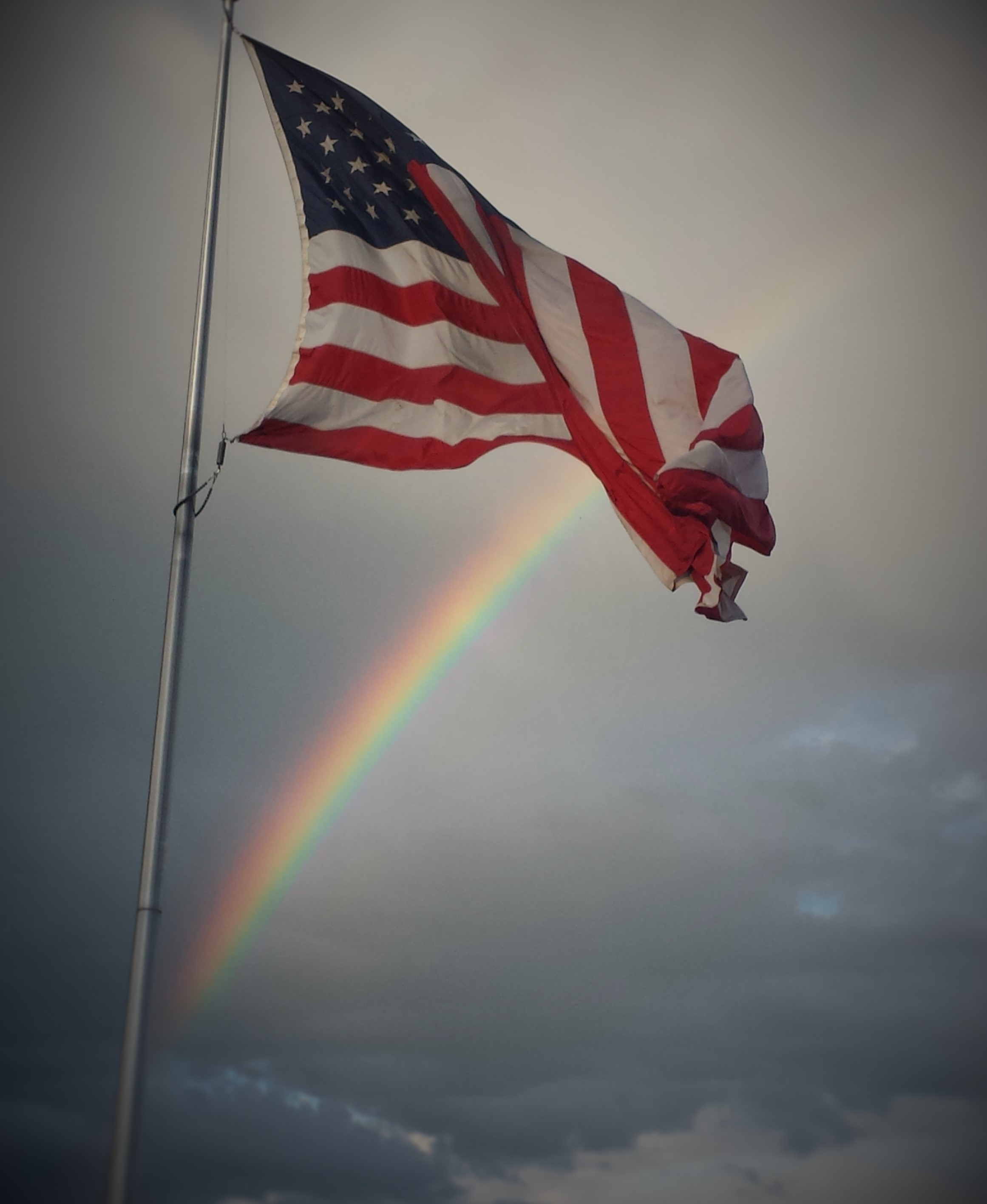 Sandpoint_Idaho_American_Flag_and_Rainbow_.jpg