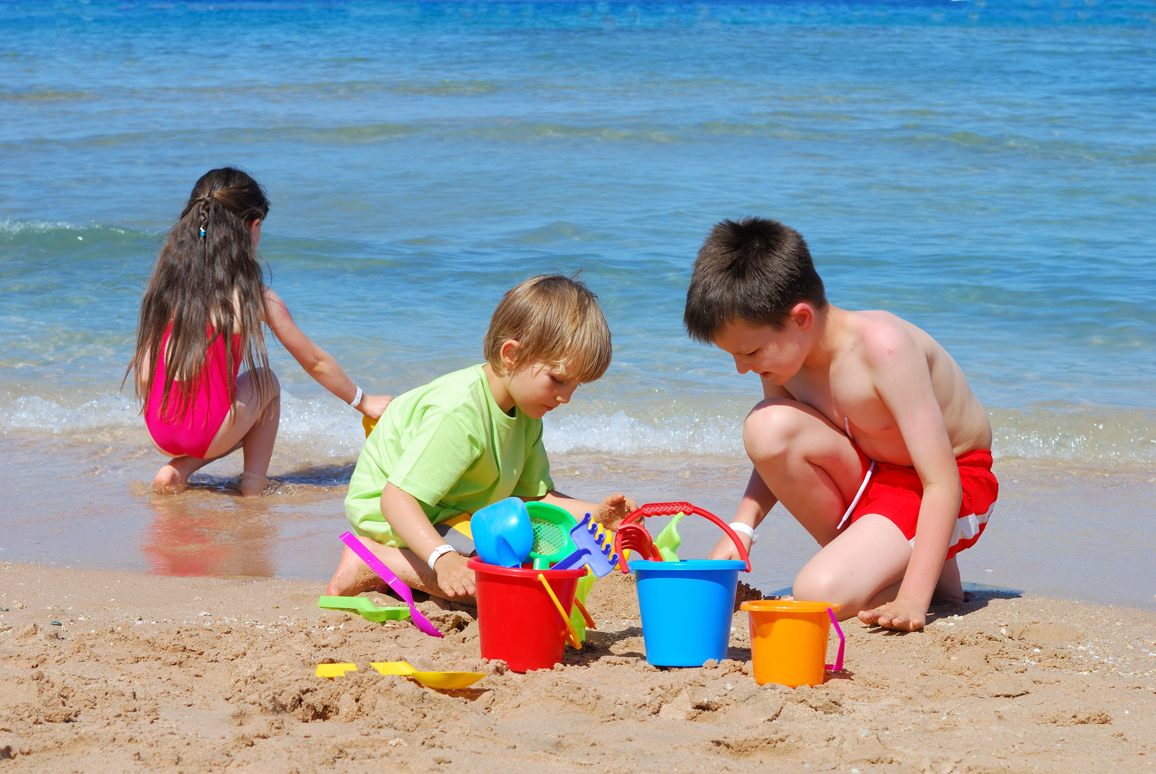 bigstock-Children-Playing-On-The-Beach-1791591.jpg