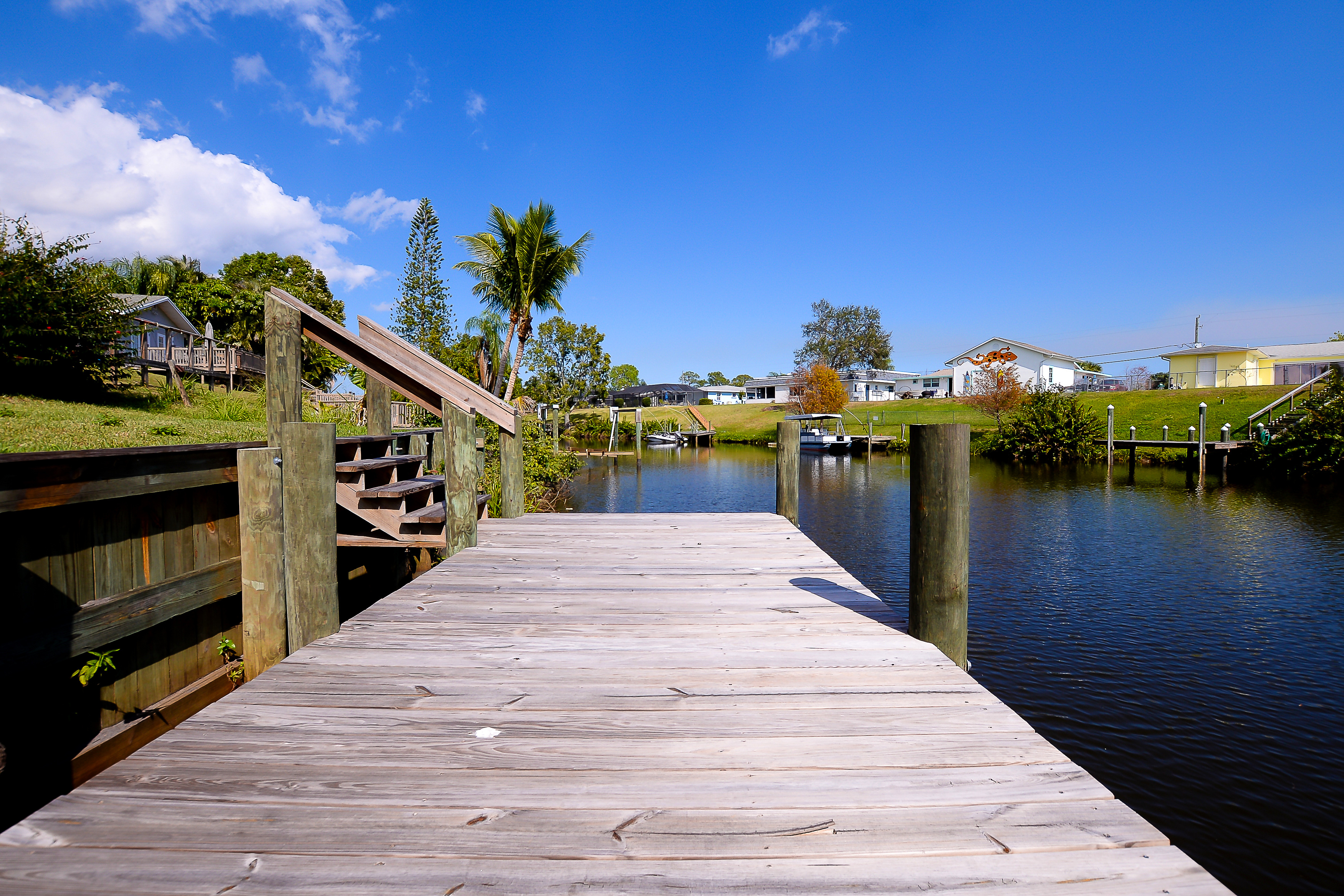 Waterfront Home for Sale w/Dock Leads St Lucie River to