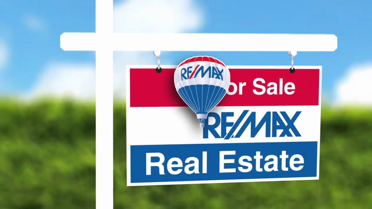 For_Sale_Hanging_REMAX_sign.jpg