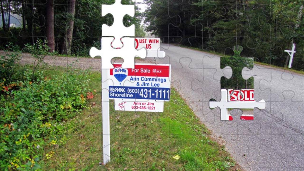 puzzle_piece_missing_small_remax_sold_sign.jpg