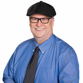 Mike Parker, "He Sells Homes Like Yours" (HUFF Realty)