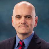 William E.