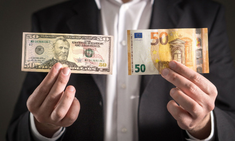 dollar-vs-euro-business-man-suit.jpg