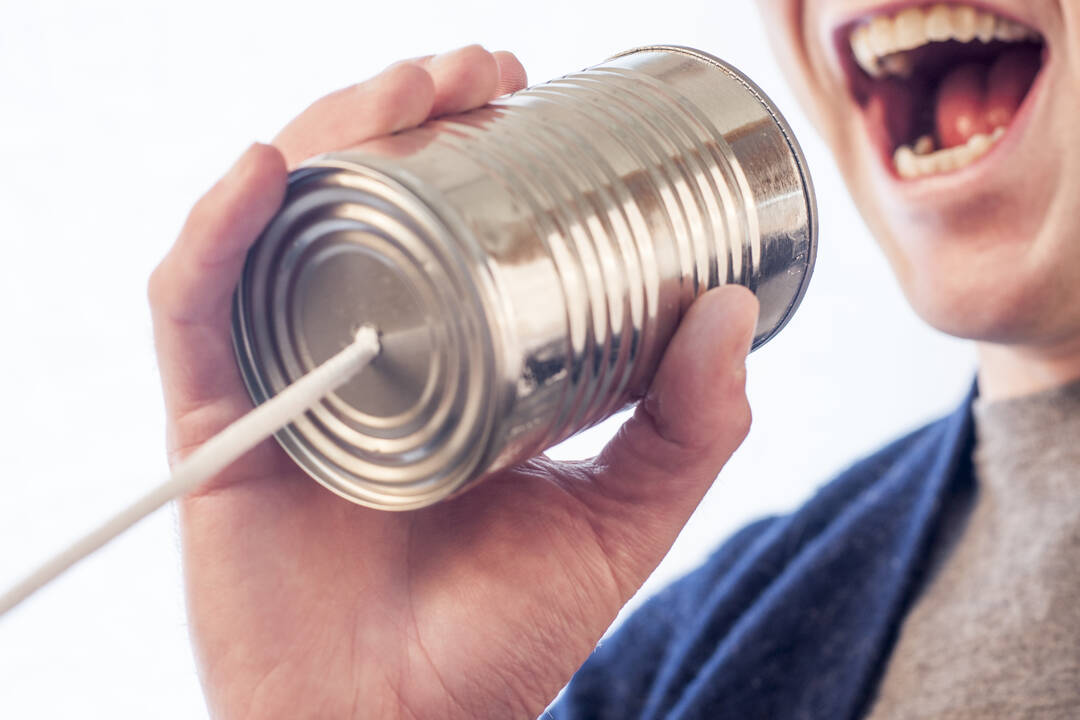 Man.Talking.Tin.Can.jpg