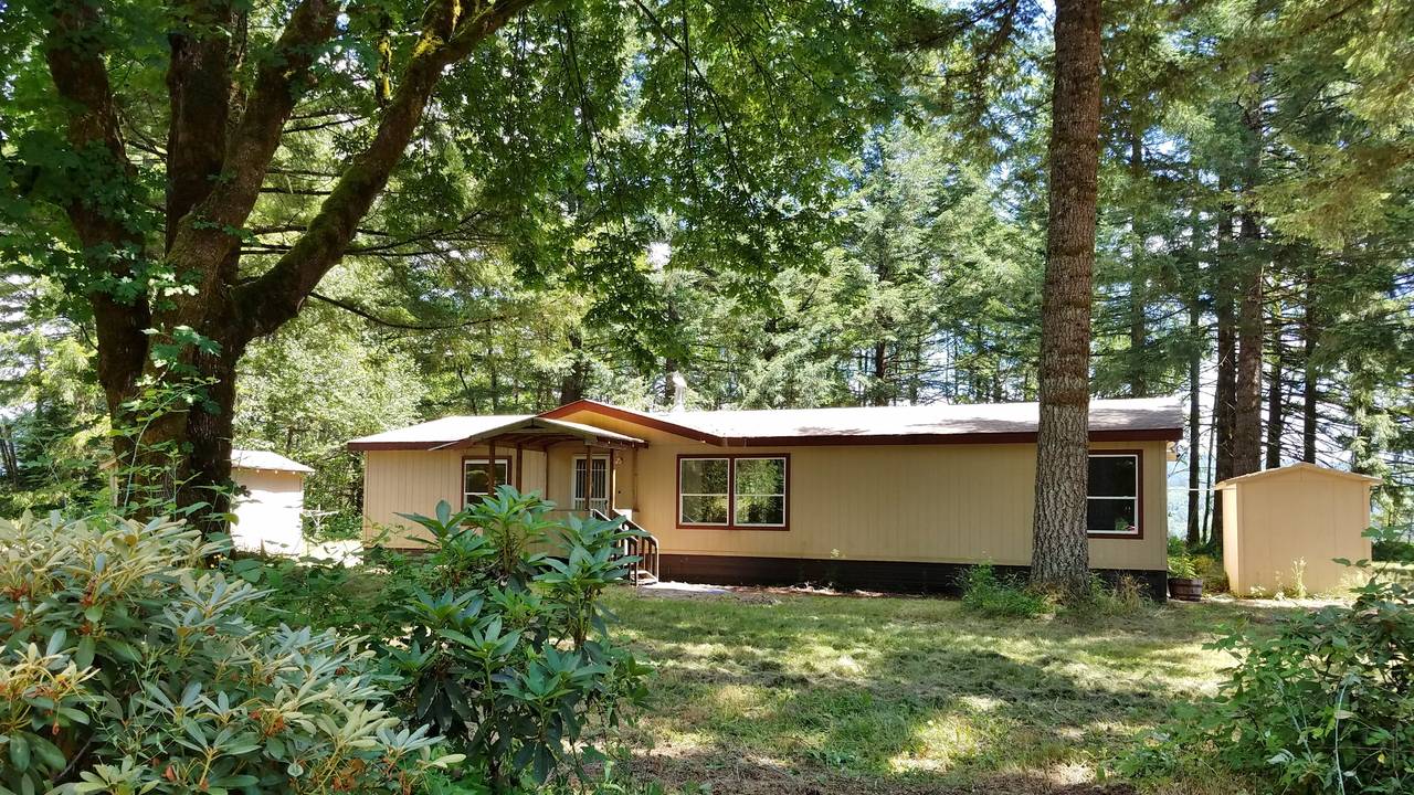 MOORE_FRONT_OF_HOME.jpg