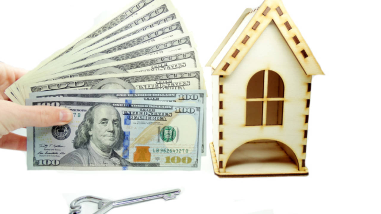 Real_Estate_Terms_The_Debt_to_Income_Ratio_and_How_It_Affects_Your_Home_Purchase.jpg