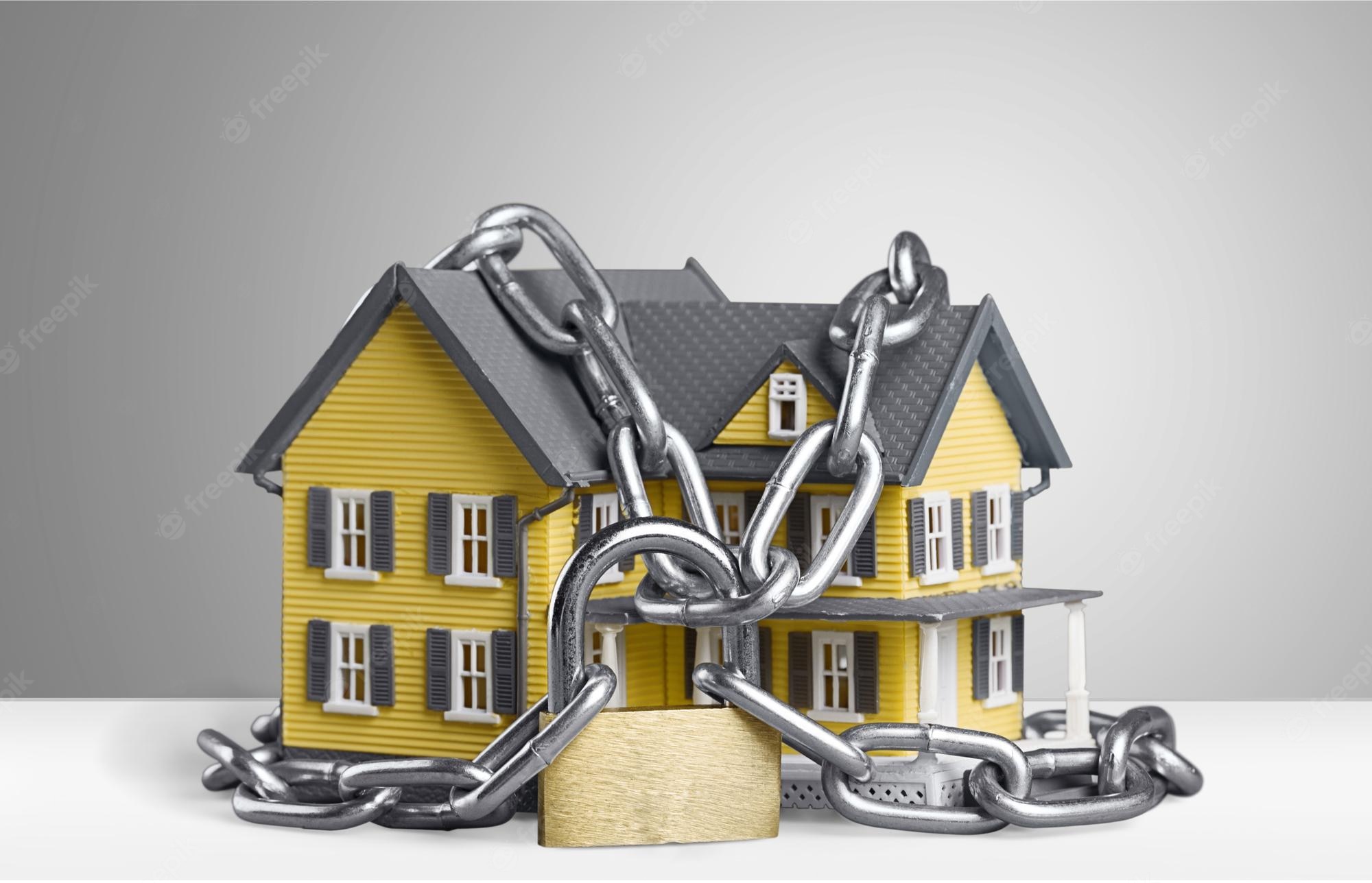 real-estate-concept-chain-with-lock-around-home-.jpg