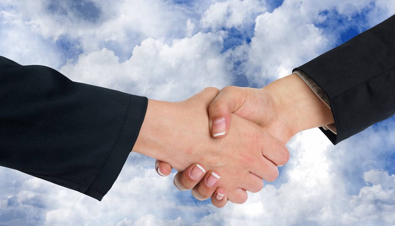 Handshake.Man.Woman.jpg