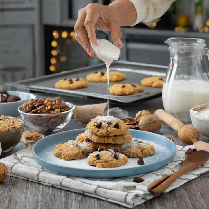 Firefly_woman_baking_cookies_in_her_kitchen__chocolate_chips__brown_sugar__vanilla_extract__walnuts_.jpg