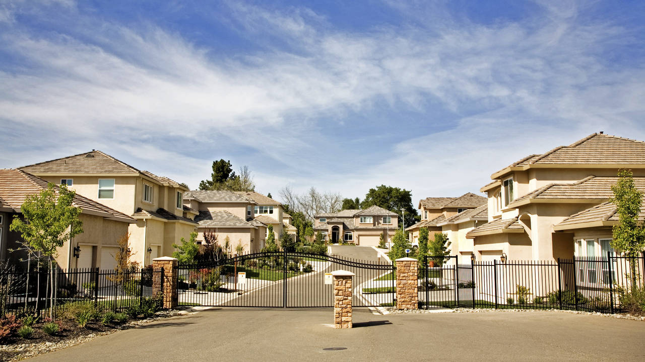 Section_1_-_Photo_3_-_Luxury_Homes_-_Gated_Entrance.jpg
