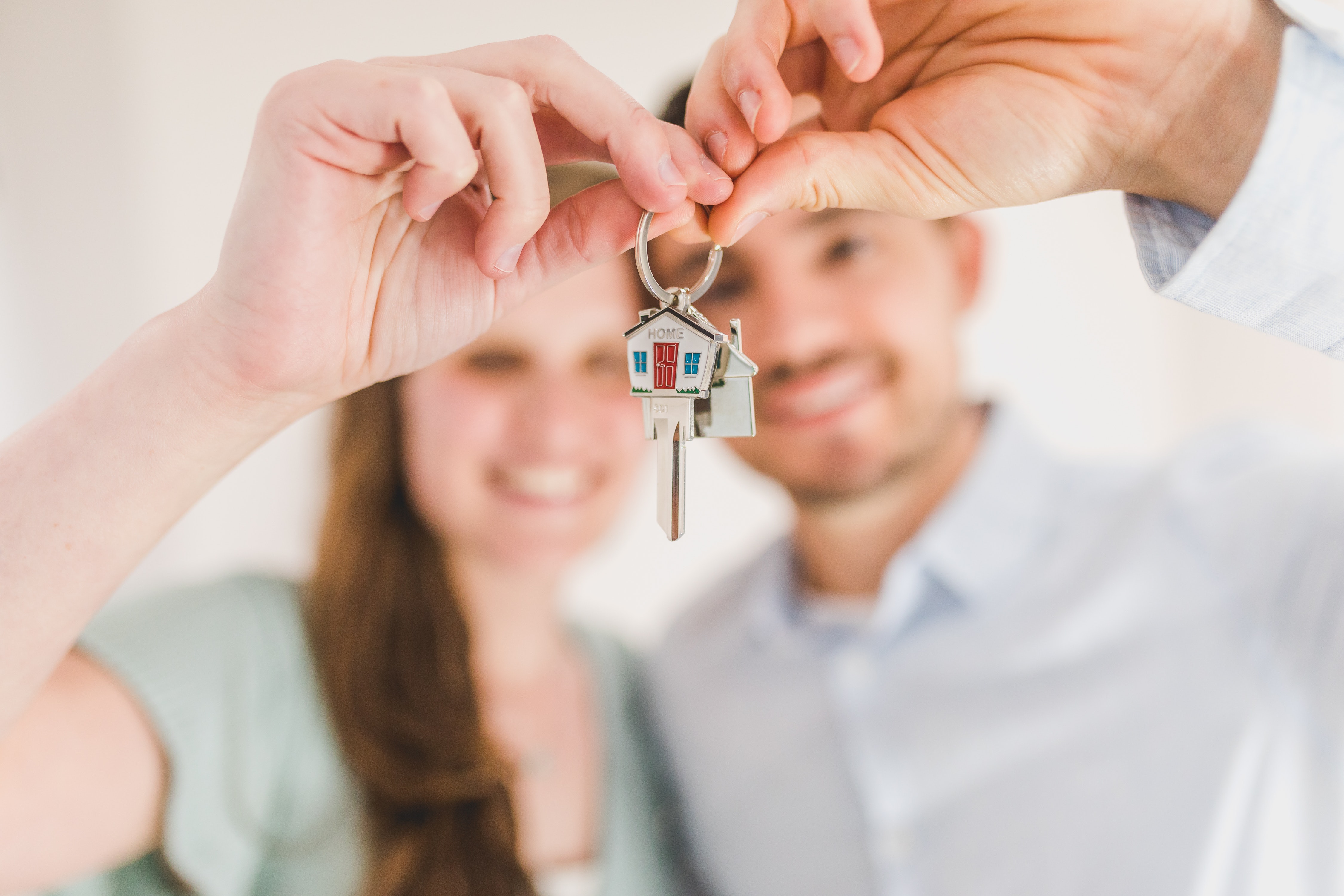 Home_Sold_Couple_with_Key.jpg