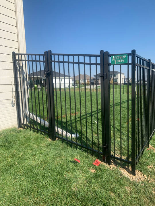 6’_tall_Black_Ornamental_Steel_Fence_with_3_Rails_and_Flat_top_by_Acreage_Fences_in_Bennington__Nebraska.3.jpg