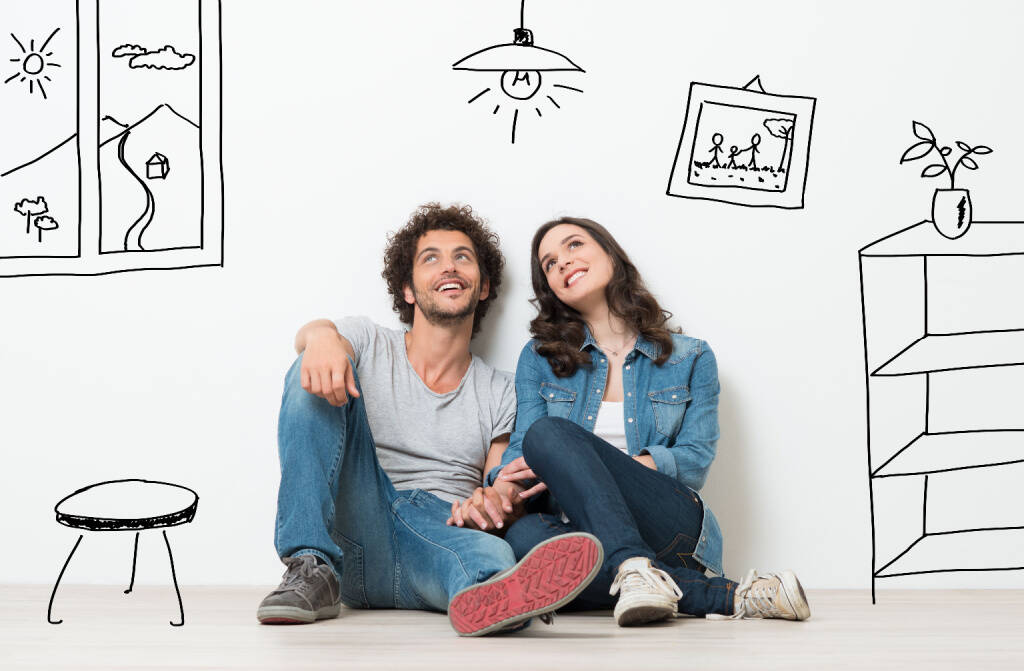 portrait-happy-young-couple-sitting.jpg