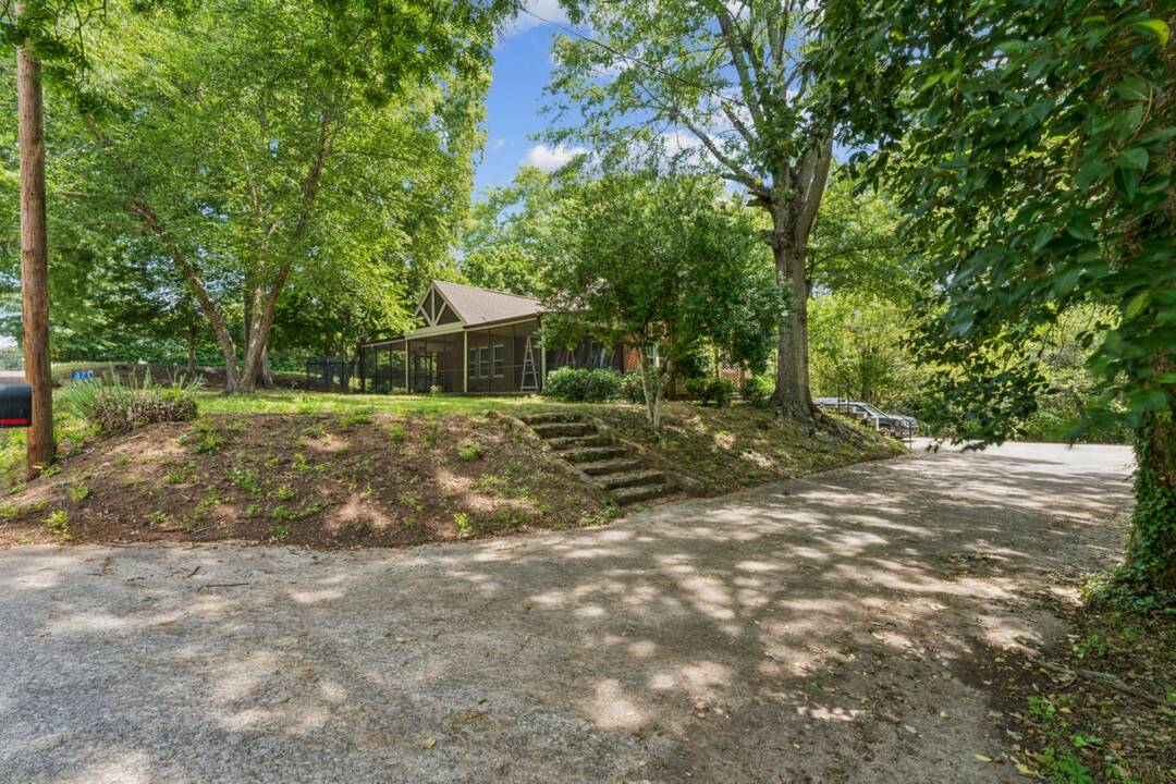 231_S_Pine_ST-_driveway_end_with_house_and_trees.jpg