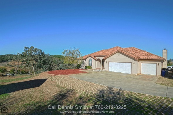 Homes for Sale in Valley Center CA - This Valley Center CA home for sale offers ample space, stunning views and lush foliage, ensuring the best of privacy and retreat.
