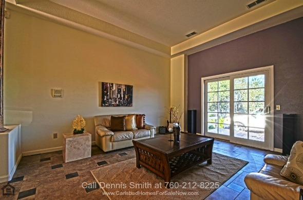 Valley Center CA Homes - The large and elegant living room of this Valley Center CA home for sale is the perfect place for entertainment and relaxation.